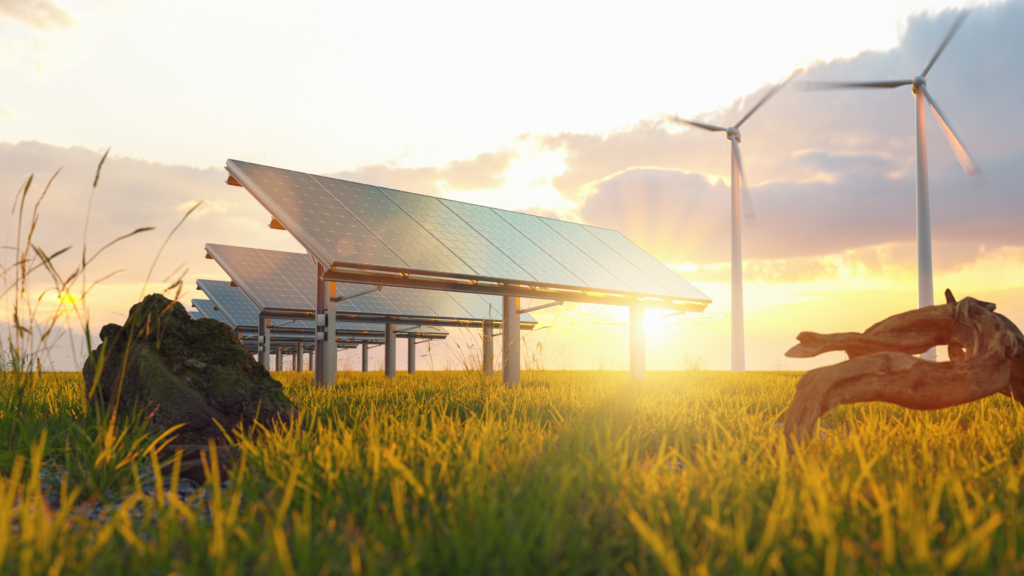 A renewable energy setup featuring a row of solar panels and three wind turbines in motion, set against a backdrop of a sunrise or sunset.