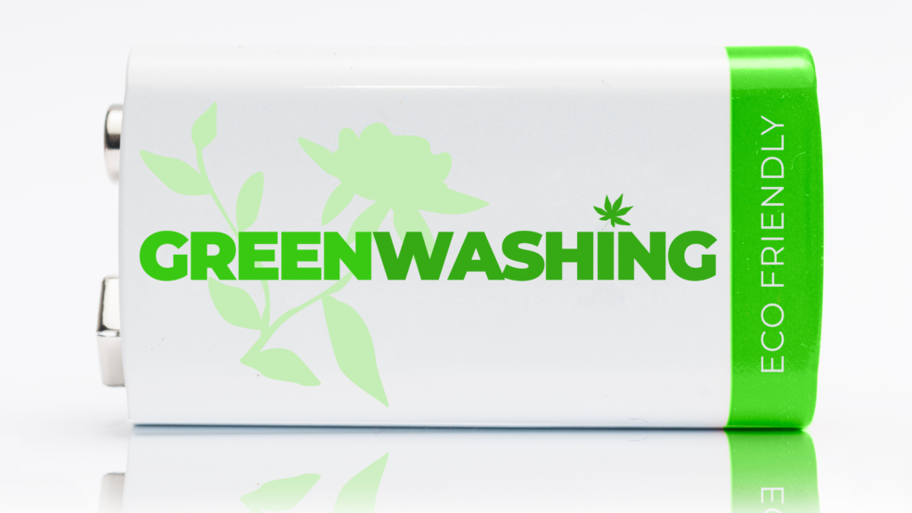 A battery with text "greenwashing" on it